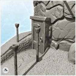 Tour en pierre hérissé de rondins avec porte et chemin d'accès aux flambeaux (12)