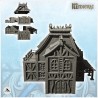 Large medieval half-timbered building with spiked roof and side canopy (30)