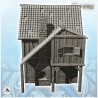 Large medieval stone house with tile roof and window canopy (7)