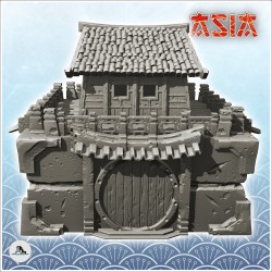 Large stone Asian building with central tower under roof and round door (26)