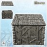 Stone half-timbered annex with large wooden door and tile roof (15)