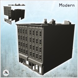 Grand immeuble moderne en brique avec cheminées et magasin au rez-de-chaussée (11)