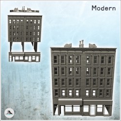 Grand immeuble moderne en brique avec cheminées et magasin au rez-de-chaussée (11)