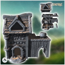 Medieval building with cauldron outside and annex with arch (40)