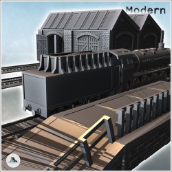 Complexe ferroviaire industriel avec hangars pour trains, locomotive et structures de chargement de minerais (12)
