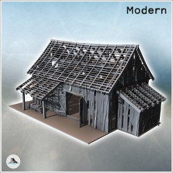 Ruined wooden building with exposed framework, side annex, and large doors (17)