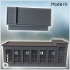 Modern industrial brick building with flat roofs, large access door, and windows (15)