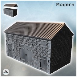 Large stone farm stable with a tin roof and wooden doors (3)