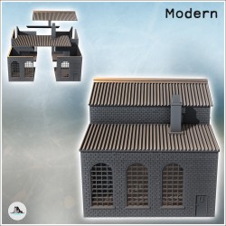 Grand entrepôt industriel en brique avec triple toits, grandes portes d'accès en bois et cheminée (19)