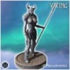 Female Viking warrior standing with a horned helmet, spear, and an axe in her hand (27)