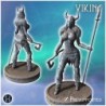 Female Viking warrior standing with a horned helmet, spear, and an axe in her hand (27)