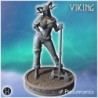 Viking woman holding a large axe, wearing detailed armor and a horned helmet (29)