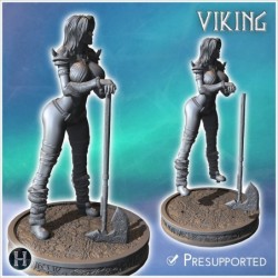 Viking woman standing with a staff and wearing spiked armor and detailed clothing (30)