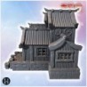 Group of traditional Japanese buildings with wooden walls, tiered roofs, and elevated foundations (4)