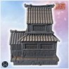 Japanese pagoda-style building with multiple tiers, wooden walls, and ornate roof details (8)