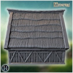 Medieval timber-framed house with thatched roof, chimney, and wooden reinforcements (10)