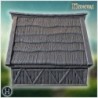 Medieval timber-framed house with thatched roof, chimney, and wooden reinforcements (10)