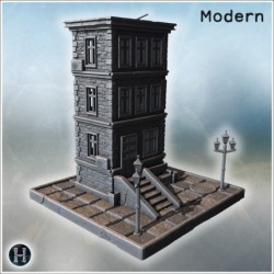 Tall stone residential building with stairs, benches, street lamps, and urban surroundings (5)