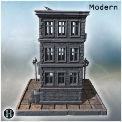 Tall stone residential building with stairs, benches, street lamps, and urban surroundings (5)