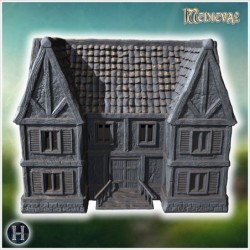 Large medieval house with wooden balconies, stone foundation, and a detailed roof structure (50)