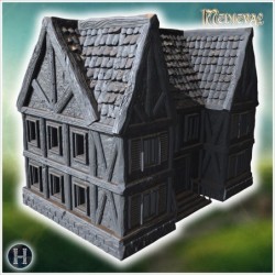 Large medieval house with wooden balconies, stone foundation, and a detailed roof structure (50)