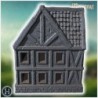 Large medieval house with wooden balconies, stone foundation, and a detailed roof structure (50)