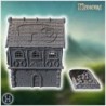 Half-timbered house with stone foundation, intricate roof design, and garden with sandbag boundaries (14)