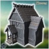 Medieval wooden house with steep roof, wooden porch, and detailed timber construction on walls (15)