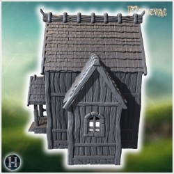 Medieval wooden house with steep roof, wooden porch, and detailed timber construction on walls (15)