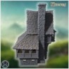 Large medieval house with steep roofs, timber framing, and stone walls with intricate details (44)