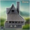 Large medieval house with steep roofs, timber framing, and stone walls with intricate details (44)