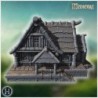 Rustic wooden house with overlapping roof shingles, thick wooden beams, and carved pillars (53)