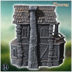 Medieval house with exterior fireplace, carved stone walls and bay window (2)