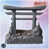 Small torii gate on stone steps with surrounding decorative bamboo and stacked rocks (5)