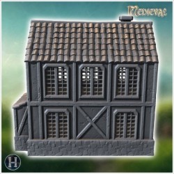 Medieval bank building with a stone base, wooden upper floors, and a shingled roof (2)