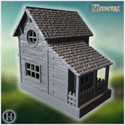 Small wooden cottage with circular window and sloped shingle roof (56)