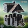 Stone house with twin gables, wooden porch, and detailed window frames (60)