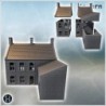 Two-story building with two chimneys and two small dormer windows on the roof (Carentan, Normandy 1944, France) (9)