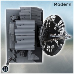 Satellite dish with adjacent structures, barrels, and fortified surroundings in rugged terrain (4)