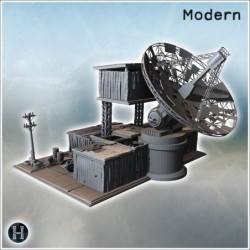 Satellite dish with adjacent structures, barrels, and fortified surroundings in rugged terrain (4)