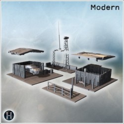 Small industrial complex with corrugated metal roofs, water tower, and antenna structures (9)