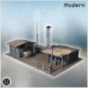 Small industrial complex with corrugated metal roofs, water tower, and antenna structures (9)