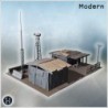 Small industrial complex with corrugated metal roofs, water tower, and antenna structures (9)