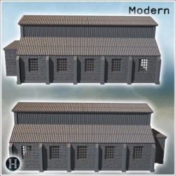 Large industrial building with stone base and corrugated roof (9)