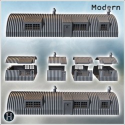 Long bâtiment en métal ondulé avec plusieurs fenêtres et cheminées sur le dessus (16)