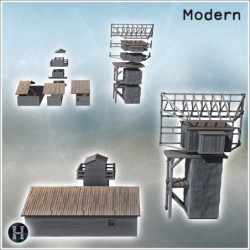 Wooden air tower on a tall stone pillar, adjacent structures with wooden frames (17)