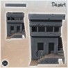 Desert building with exposed external stairs and glazed room upstairs (17)