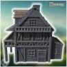 Half-timbered medieval house with a large balcony, stone foundation, and wooden railings (26)