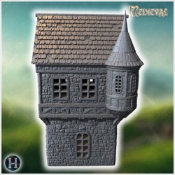 Tall medieval building with a turret, stone walls, and a pointed roof with timber supports (30)