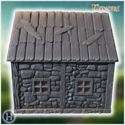 Small medieval stone cottage with wooden door, circular window, and steeply pitched shingled roof (31)